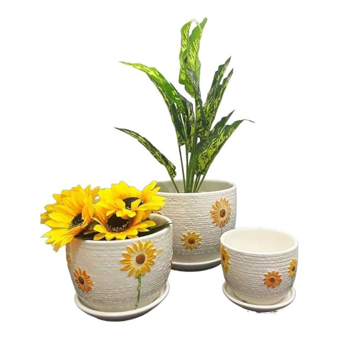 SET DE 3 MACETEROS CERAMICA CON BASE DISEÑO GIRASOLES, PRECIO OFERTA $19.990 GRANDE - Alto: 18 CM - Diámetro: 22 CM MEDIANO - Alto: 14 CM - Diámetro: 17 CM PEQUEÑO - Alto: 11 CM - Diámetro: 14 CM COD:1238